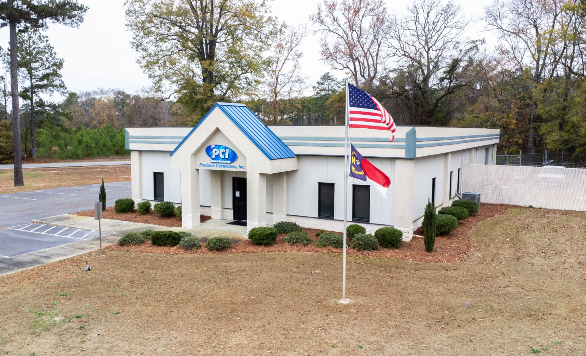 a building with a blue and white sign